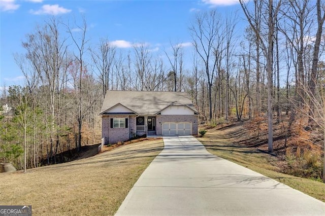 197 Saddleridge Dr, Bremen, GA 30110 - view of front of home featuring an attached garage, brick siding, and concrete driveway