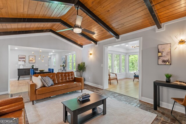 living area featuring wood ceiling, lofted ceiling with beams, baseboards, and stone finish flooring