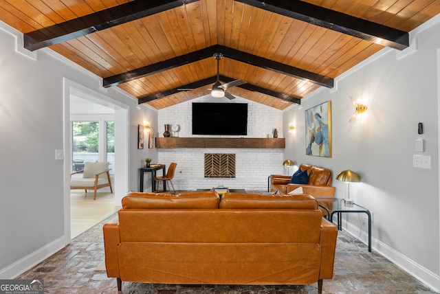 2672 Langland Ct NE, Atlanta, GA 30345 - living room with stone tile flooring, baseboards, ceiling fan, and wood ceiling