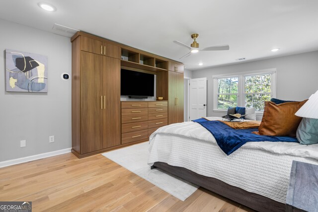 bedroom with recessed lighting, visible vents, light wood finished floors, and baseboards
