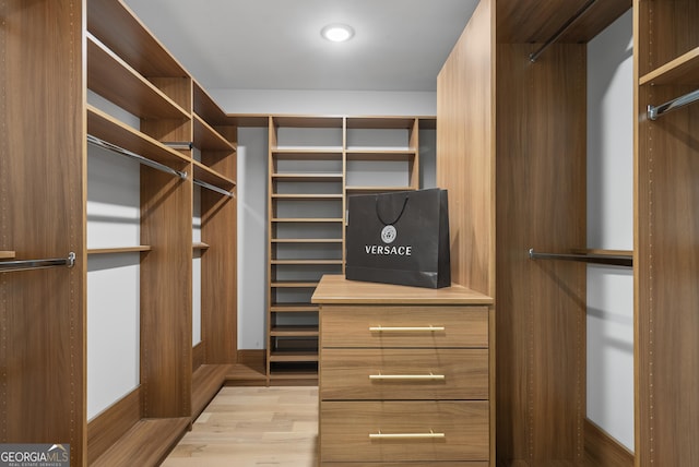 2672 Langland Ct NE, Atlanta, GA 30345 - walk in closet featuring wood finished floors