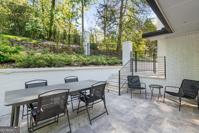 2672 Langland Ct NE, Atlanta, GA 30345 - view of patio with outdoor dining area and fence