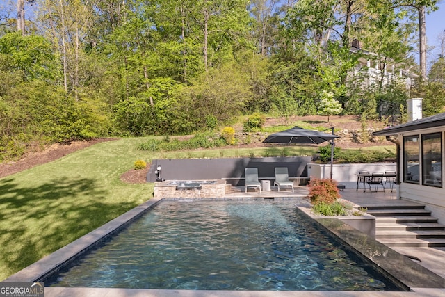 2672 Langland Ct NE, Atlanta, GA 30345 - swimming pool with a lawn and a wooden deck
