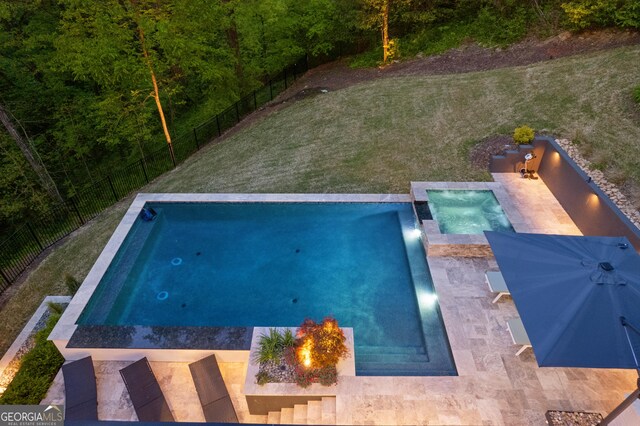 view of pool with a patio area, a fenced backyard, a fenced in pool, and a yard