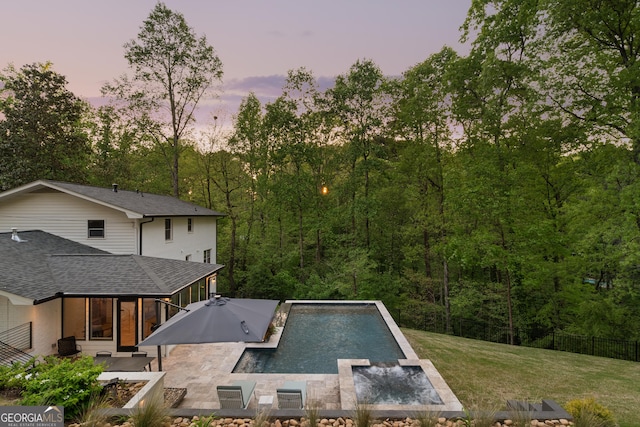 2672 Langland Ct NE, Atlanta, GA 30345 - view of pool with a patio area and a pool with connected hot tub