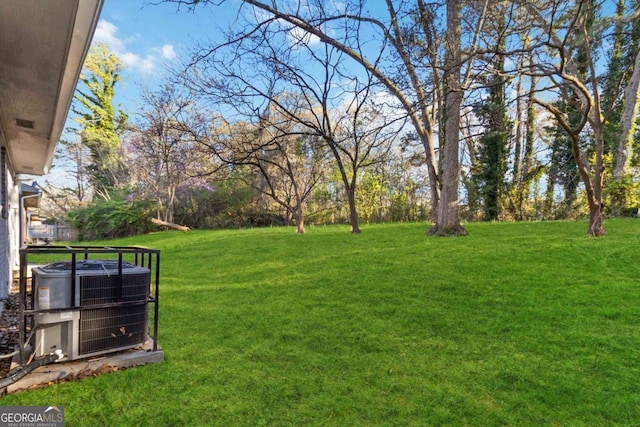 view of yard featuring central AC