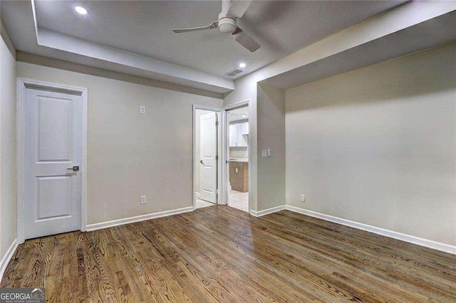 810 Commodore Dr NW, Atlanta, GA 30318 - unfurnished bedroom with baseboards, wood finished floors, recessed lighting, and a ceiling fan