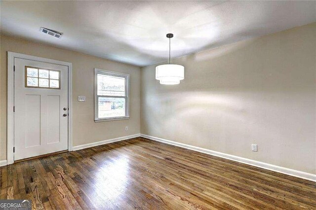 810 Commodore Dr NW, Atlanta, GA 30318 - entrance foyer featuring baseboards and dark wood finished floors