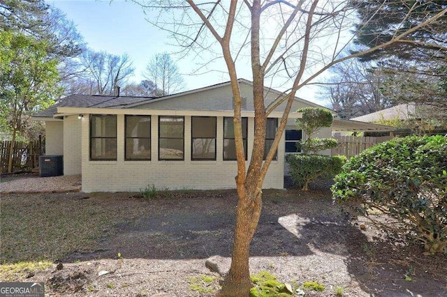 810 Commodore Dr NW, Atlanta, GA 30318 - view of front facade featuring brick siding and cooling unit