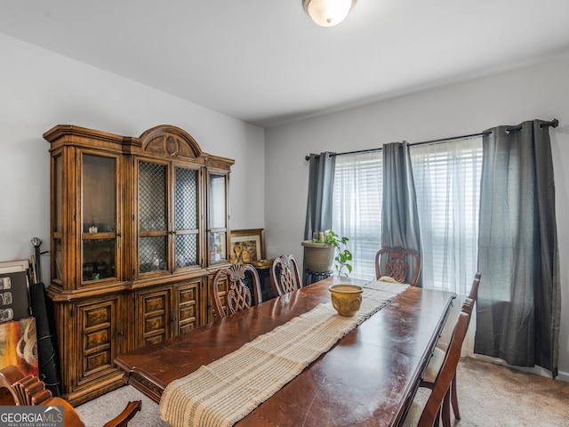 dining area with light carpet