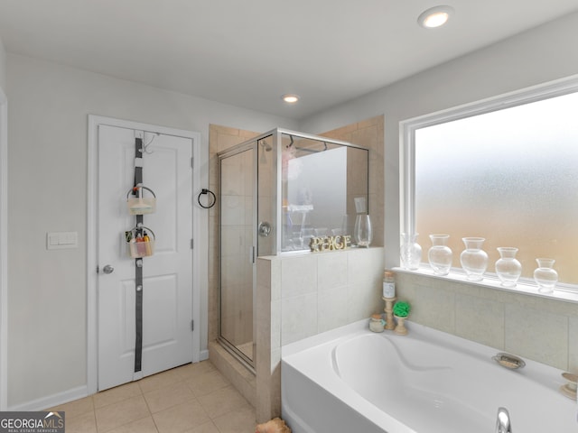 full bath with a bath, recessed lighting, a stall shower, and tile patterned flooring