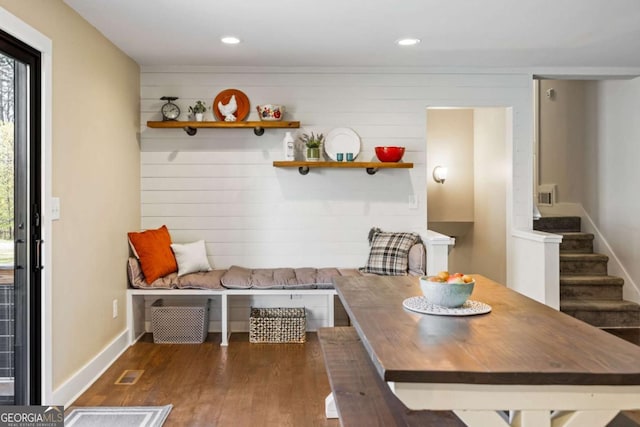 dining room with stairway, wood finished floors, baseboards, visible vents, and recessed lighting