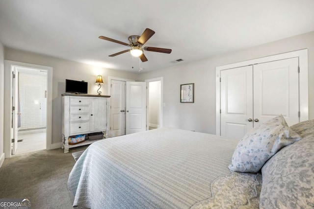 bedroom featuring ensuite bathroom, visible vents, ceiling fan, and carpet