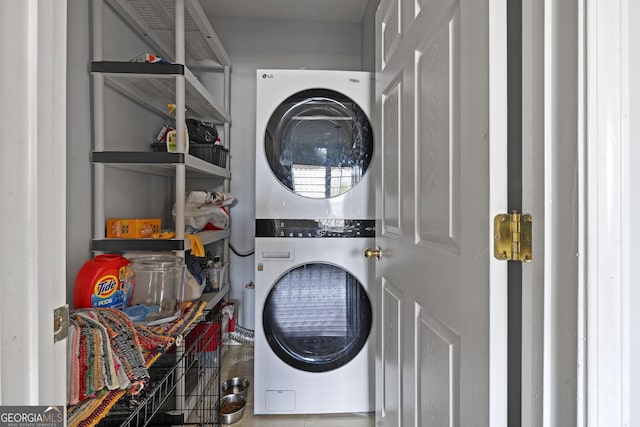 85 Clairidge Ln, Lawrenceville, GA 30046 - clothes washing area with stacked washer and clothes dryer and laundry area