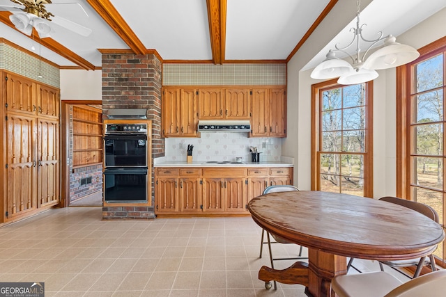 9095 Cedar Grove Rd, Fairburn, GA 30213 - kitchen with white electric stovetop, light countertops, dobule oven black, beamed ceiling, and extractor fan