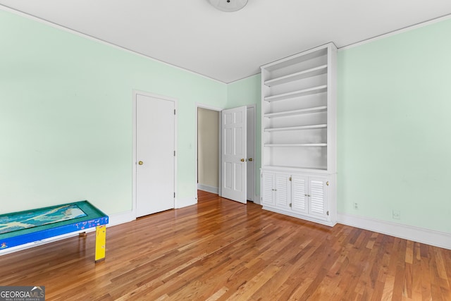 9095 Cedar Grove Rd, Fairburn, GA 30213 - unfurnished bedroom featuring baseboards and wood finished floors