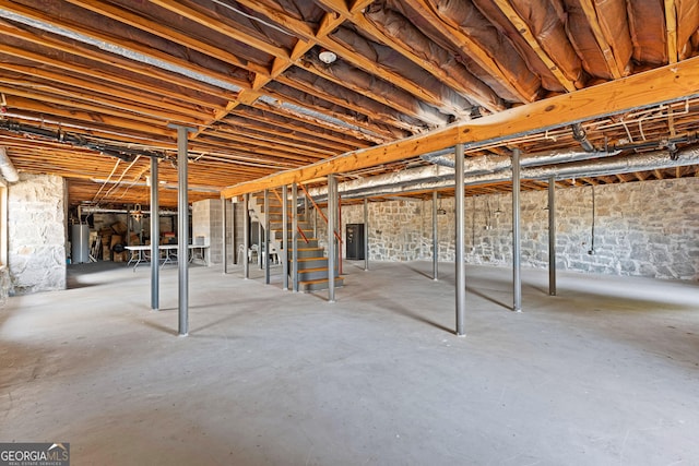 9095 Cedar Grove Rd, Fairburn, GA 30213 - unfinished below grade area with gas water heater and stairs