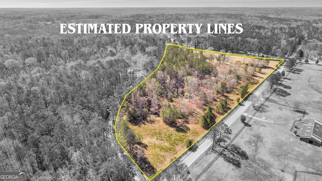 9095 Cedar Grove Rd, Fairburn, GA 30213 - aerial view featuring a view of trees