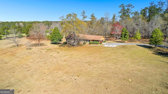 9095 Cedar Grove Rd, Fairburn, GA 30213 - aerial view featuring a view of trees