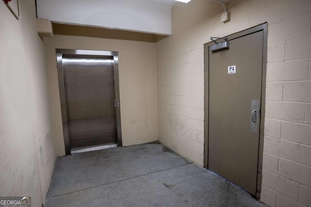 401 16th St NW Unit 1463, Atlanta, GA 30363 - doorway to property with concrete block siding and elevator