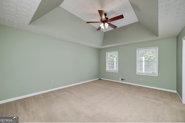 195 Creekside Way, Mcdonough, GA 30252 - carpeted spare room featuring a tray ceiling, a ceiling fan, baseboards, and a textured ceiling