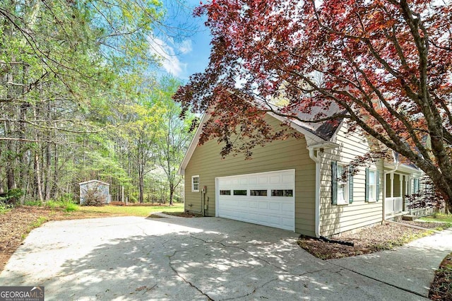 195 Creekside Way, Mcdonough, GA 30252 - view of side of property featuring driveway and an attached garage