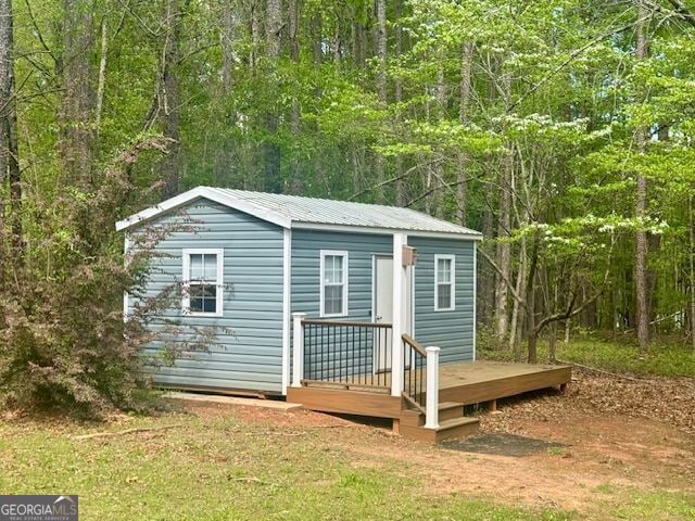 195 Creekside Way, Mcdonough, GA 30252 - view of outdoor structure featuring a forest view