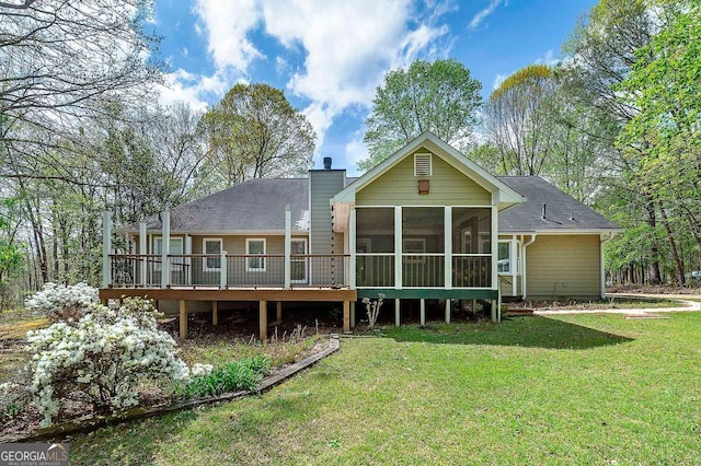 195 Creekside Way, Mcdonough, GA 30252 - rear view of property featuring a chimney, a yard, a deck, and a sunroom