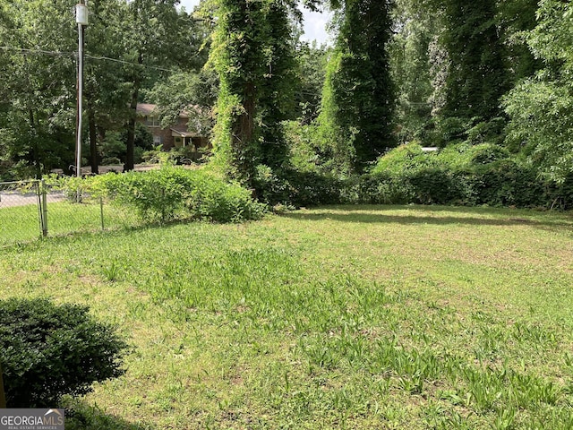 view of yard featuring fence