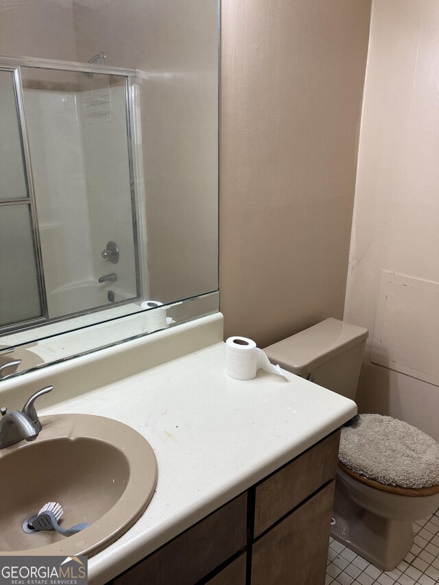 1288 Lakewood Dr NE, Conyers, GA 30013 - full bath with toilet, tile patterned floors, and vanity