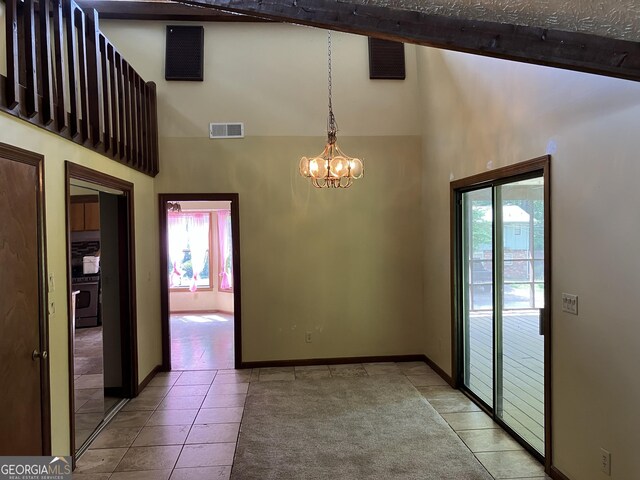 unfurnished dining area featuring visible vents, beam ceiling, light tile patterned floors, high vaulted ceiling, and an inviting chandelier