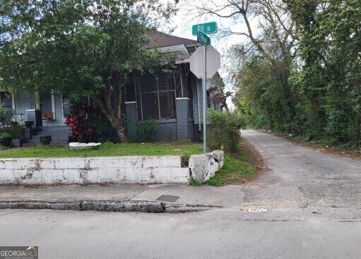 view of property exterior featuring driveway