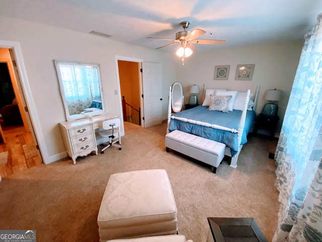 bedroom with a ceiling fan, carpet, baseboards, and visible vents