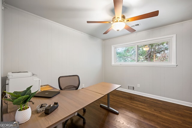office with baseboards, visible vents, a ceiling fan, and wood finished floors