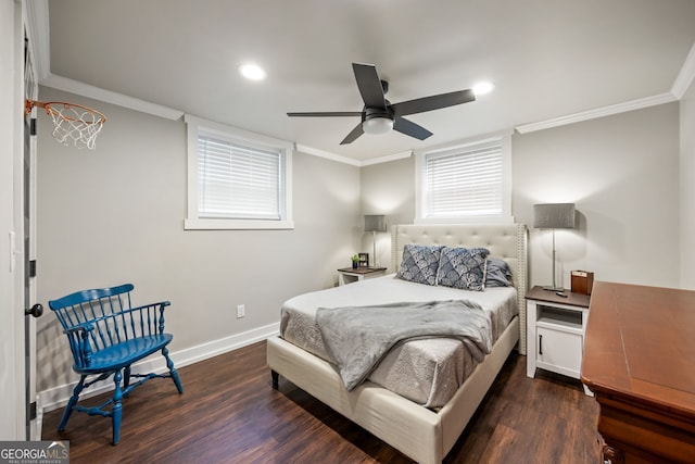 bedroom featuring ornamental molding, baseboards, and wood finished floors