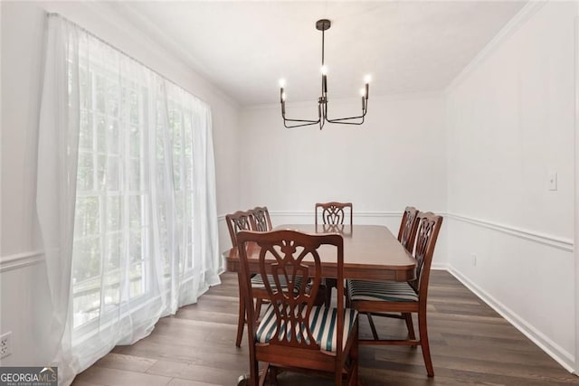 2731 Old Coach Rd, Duluth, GA 30096 - dining room with a chandelier, wood finished floors, and ornamental molding
