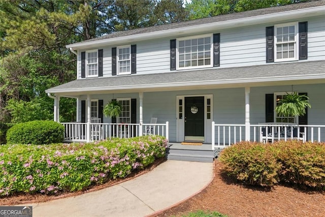 2731 Old Coach Rd, Duluth, GA 30096 - view of front of home with a porch