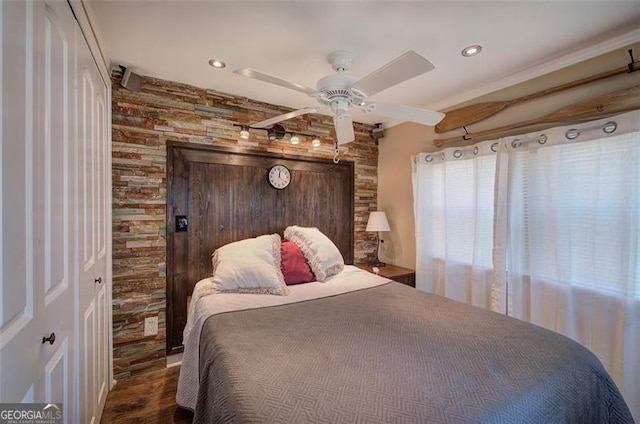 bedroom featuring wood finished floors, recessed lighting, and a ceiling fan