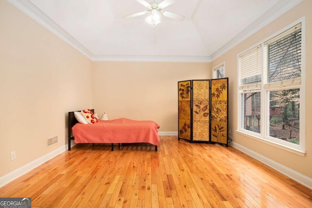 4236 Providence Ln, Tucker, GA 30084 - bedroom featuring crown molding, baseboards, light wood finished floors, and visible vents
