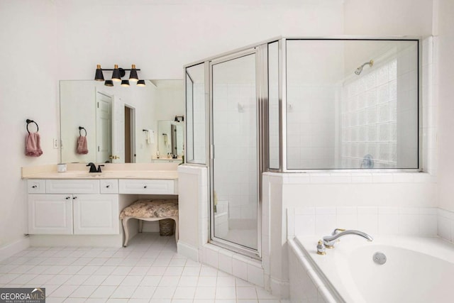 4236 Providence Ln, Tucker, GA 30084 - bathroom featuring tile patterned flooring, vanity, a bath, and a shower stall
