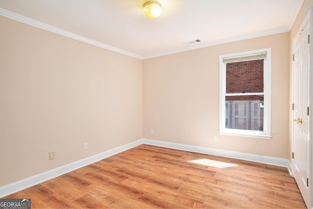 4236 Providence Ln, Tucker, GA 30084 - empty room with light wood-type flooring, ornamental molding, baseboards, and visible vents