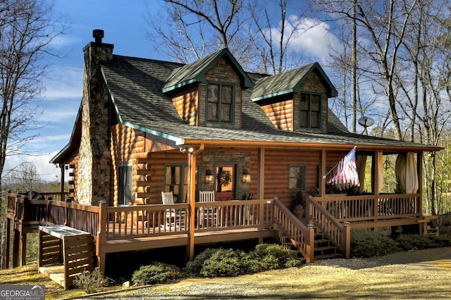 back of property featuring a chimney