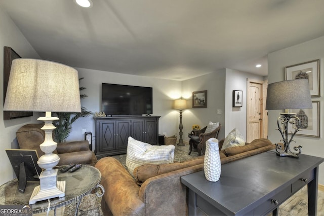 living area with recessed lighting