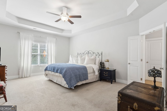 5726 Taylor Way, Sandy Springs, GA 30342 - bedroom featuring a tray ceiling, light carpet, and ceiling fan