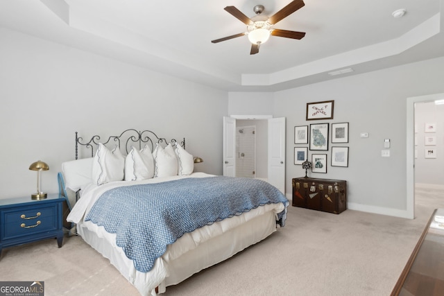5726 Taylor Way, Sandy Springs, GA 30342 - bedroom featuring a tray ceiling, light colored carpet, and ceiling fan