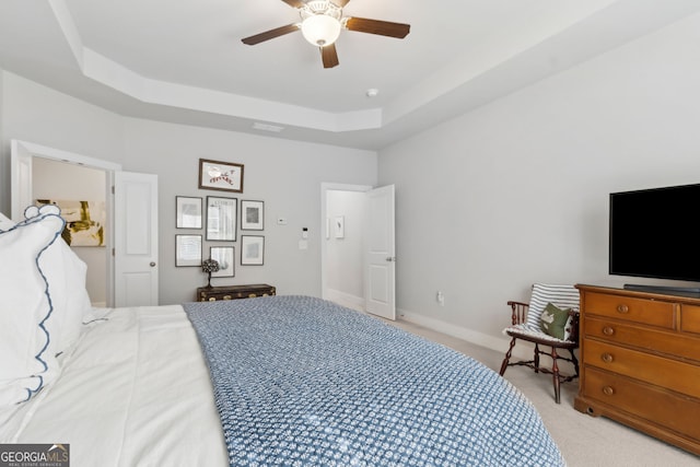 5726 Taylor Way, Sandy Springs, GA 30342 - bedroom with light carpet, a tray ceiling, and a ceiling fan