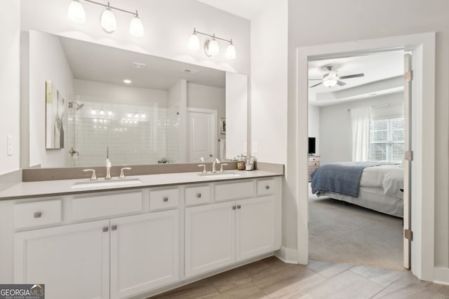 5726 Taylor Way, Sandy Springs, GA 30342 - ensuite bathroom featuring double vanity, a stall shower, and ceiling fan