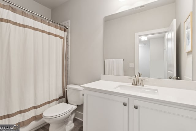 5726 Taylor Way, Sandy Springs, GA 30342 - bathroom with vanity, curtained shower, and wood finished floors