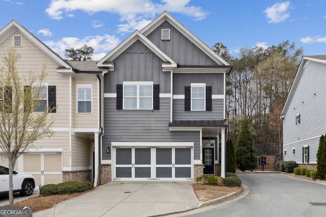 5726 Taylor Way, Sandy Springs, GA 30342 - view of front of house featuring asphalt driveway, board and batten siding, brick siding, and a garage