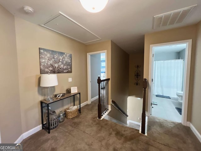 bedroom featuring dark colored carpet, visible vents, ceiling fan, baseboards, and a closet